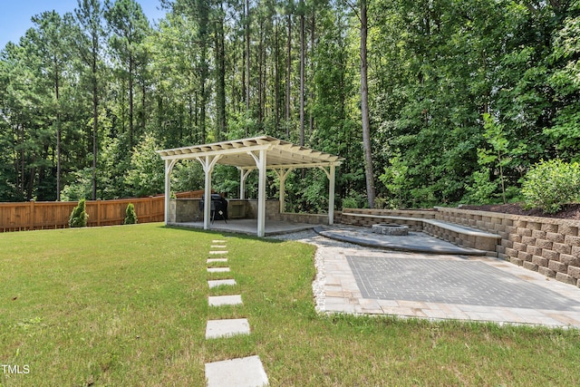 1705 Pointe Xing, Apex, NC 27523 - fenced yard with a fire pit, a pergola, and a patio area