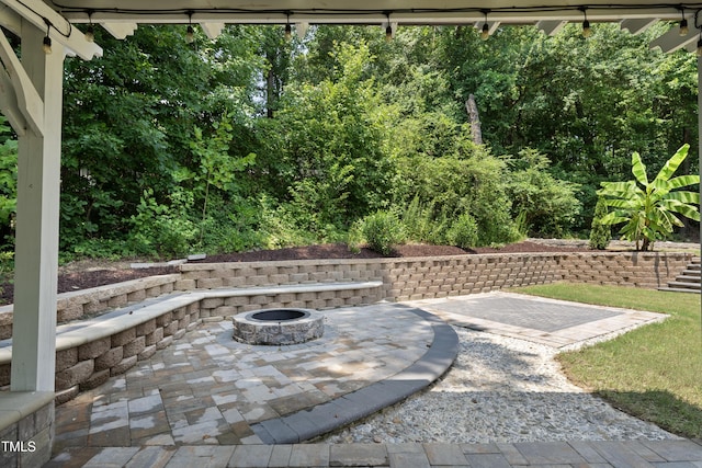 1705 Pointe Xing, Apex, NC 27523 - view of patio / terrace with an outdoor fire pit