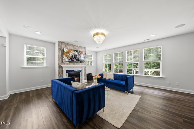 1705 Pointe Xing, Apex, NC 27523 - living area featuring a fireplace, wood finished floors, and recessed lighting
