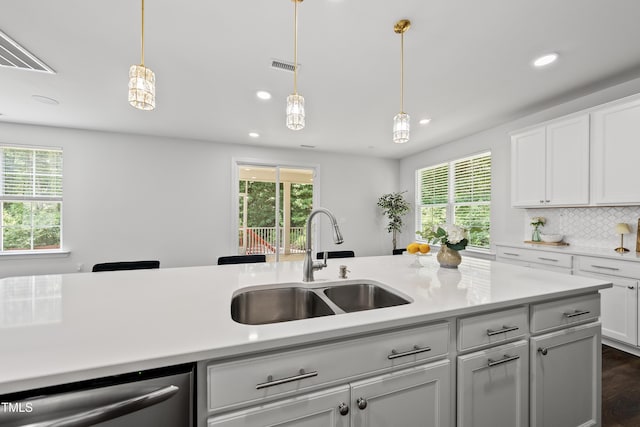 1705 Pointe Xing, Apex, NC 27523 - kitchen featuring dishwasher, recessed lighting, light countertops, and plenty of natural light