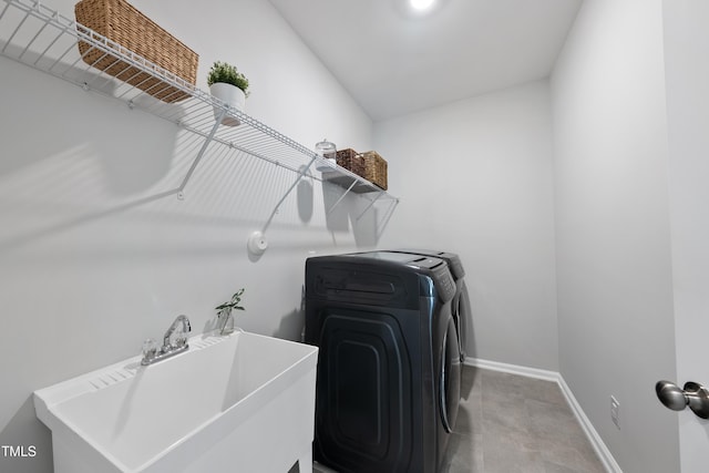 1705 Pointe Xing, Apex, NC 27523 - laundry room featuring washing machine and clothes dryer and baseboards