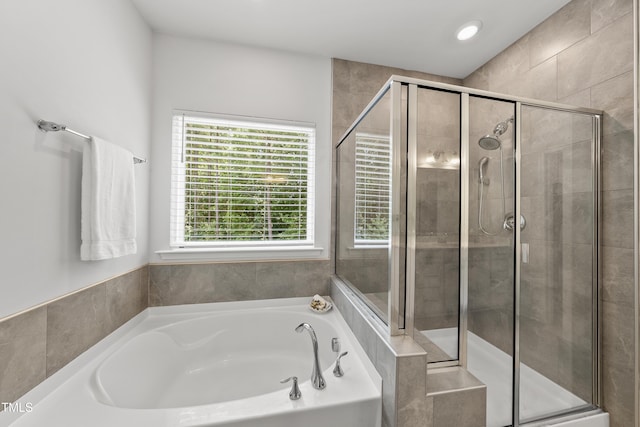 1705 Pointe Xing, Apex, NC 27523 - bathroom featuring a garden tub, a shower stall, and recessed lighting