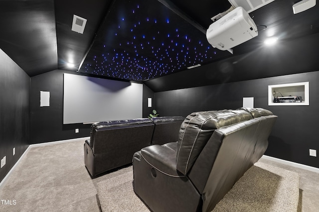 1705 Pointe Xing, Apex, NC 27523 - carpeted home theater room featuring vaulted ceiling and baseboards