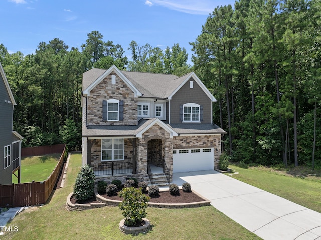 1705 Pointe Xing, Apex, NC 27523 - craftsman inspired home featuring stone siding, a garage, driveway, covered porch, and roof with shingles
