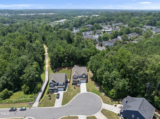 1705 Pointe Xing, Apex, NC 27523 - aerial view of property and surrounding area with nearby suburban area and a forest
