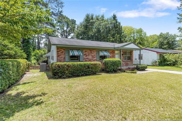 1109 Chesterfield Dr, Fayetteville, NC 28305 - view of front facade with brick siding and a front yard