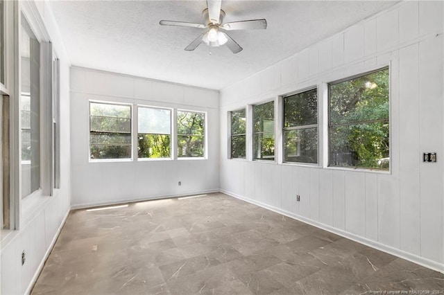 1109 Chesterfield Dr, Fayetteville, NC 28305 - unfurnished sunroom with a textured ceiling and a decorative wall