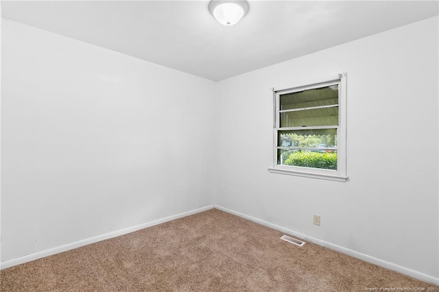 1109 Chesterfield Dr, Fayetteville, NC 28305 - carpeted empty room featuring baseboards