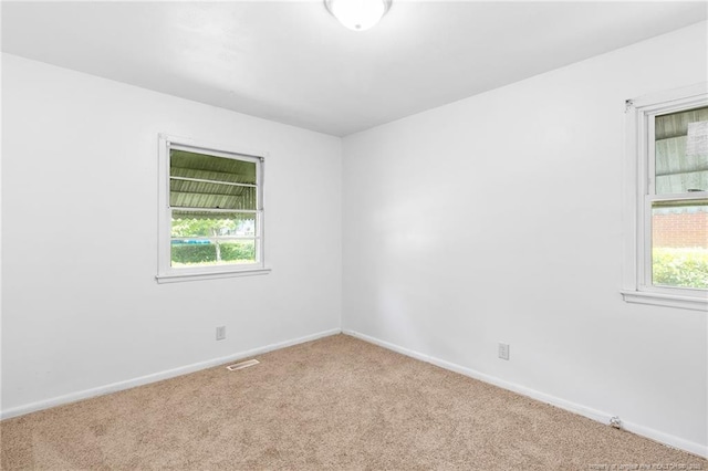 1109 Chesterfield Dr, Fayetteville, NC 28305 - spare room with carpet floors and healthy amount of natural light