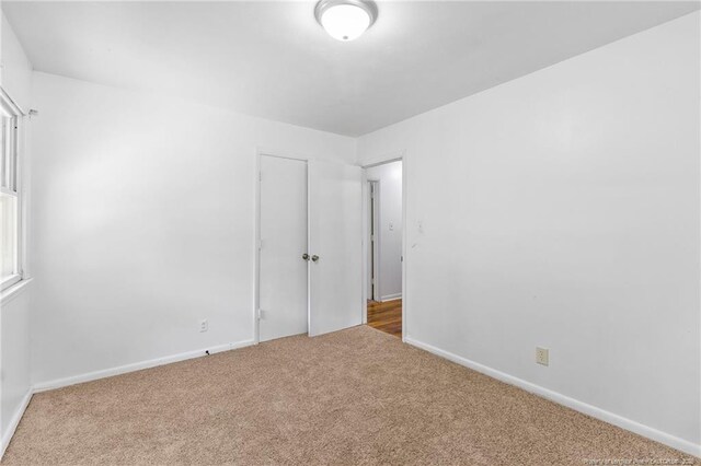 1109 Chesterfield Dr, Fayetteville, NC 28305 - carpeted empty room with baseboards
