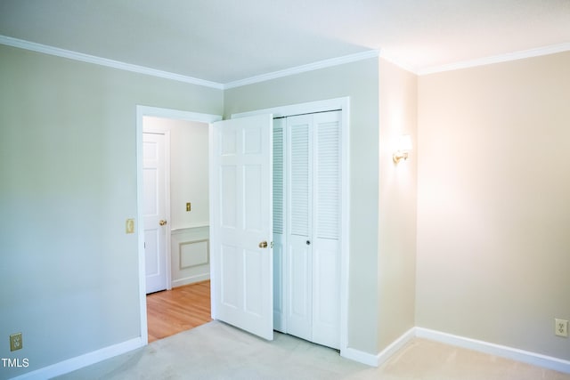 70 Sand Trap Ln, Roxboro, NC 27574 - unfurnished bedroom featuring carpet, ornamental molding, and a closet