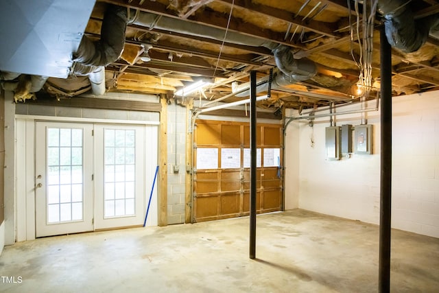 70 Sand Trap Ln, Roxboro, NC 27574 - basement featuring a garage, electric panel, and concrete block wall