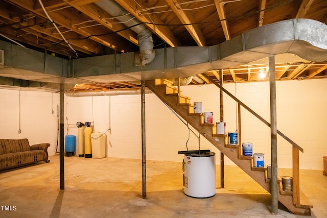 70 Sand Trap Ln, Roxboro, NC 27574 - unfinished basement featuring electric water heater, a water softener system, stairs, and concrete block wall
