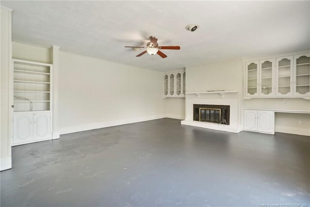 2619 Dumfries Dr, Fayetteville, NC 28306 - unfurnished living room with concrete flooring, ceiling fan, and a brick fireplace