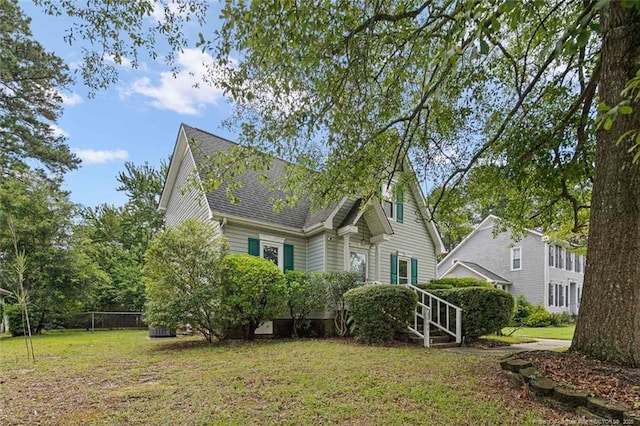 3464 Mcchoen Dr, Fayetteville, NC 28311 - view of side of home featuring a shingled roof