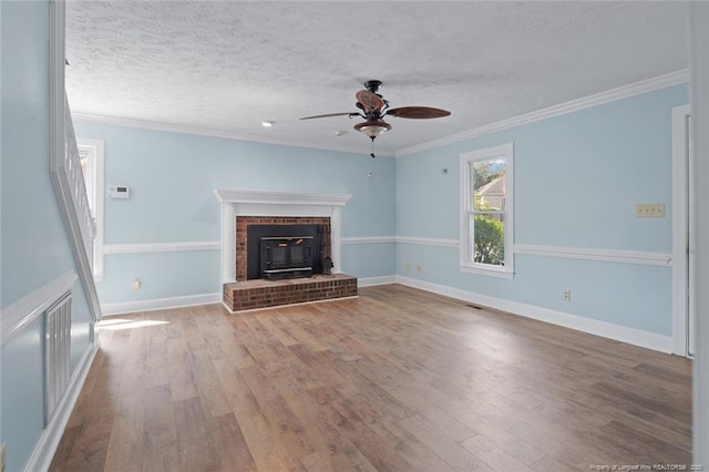 3464 Mcchoen Dr, Fayetteville, NC 28311 - unfurnished living room with hardwood / wood-style floors, a ceiling fan, ornamental molding, and a textured ceiling