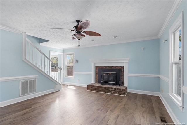 3464 Mcchoen Dr, Fayetteville, NC 28311 - unfurnished living room with a textured ceiling, ceiling fan, wood finished floors, stairway, and ornamental molding