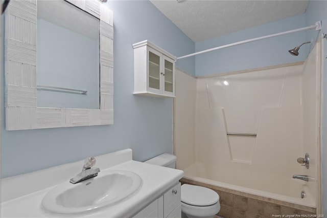 3464 Mcchoen Dr, Fayetteville, NC 28311 - bathroom with washtub / shower combination, vanity, and a textured ceiling