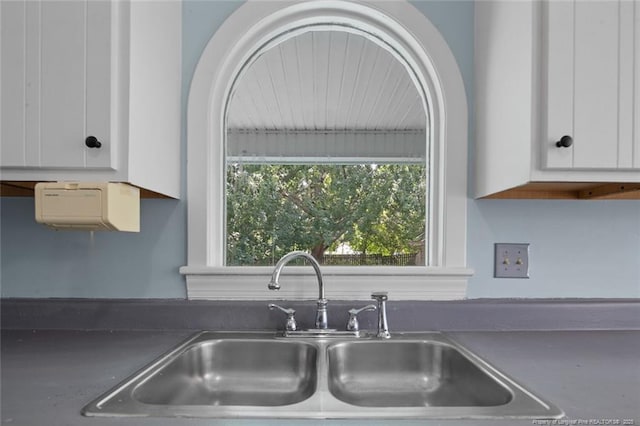 3464 Mcchoen Dr, Fayetteville, NC 28311 - kitchen view of a sink and white cabinets