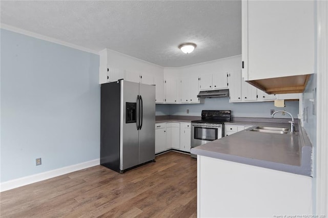 3464 Mcchoen Dr, Fayetteville, NC 28311 - kitchen with stainless steel appliances, under cabinet range hood, a textured ceiling, white cabinetry, and dark wood-type flooring