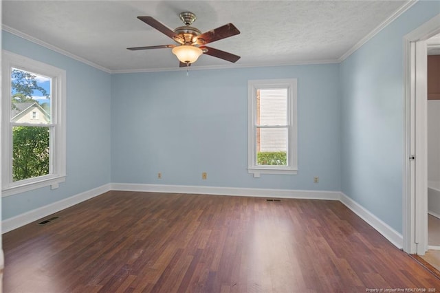 3464 Mcchoen Dr, Fayetteville, NC 28311 - empty room with healthy amount of natural light, dark wood-type flooring, ceiling fan, and ornamental molding