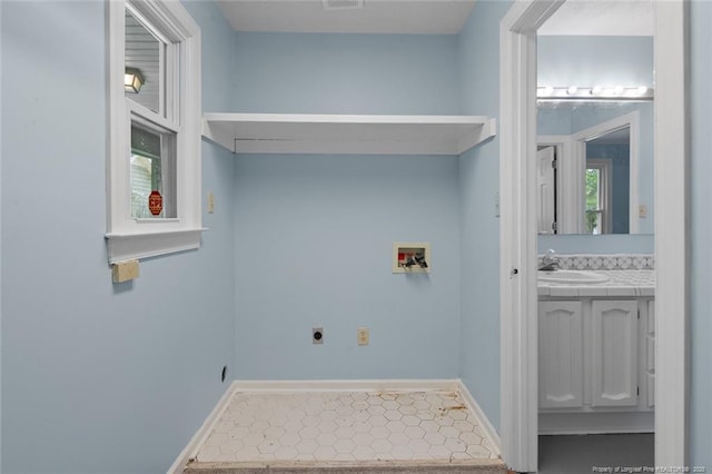 3464 Mcchoen Dr, Fayetteville, NC 28311 - washroom featuring hookup for a washing machine, hookup for an electric dryer, and tile patterned floors