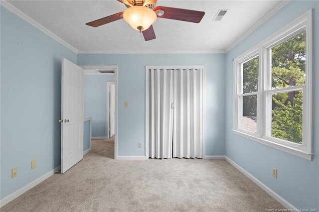 3464 Mcchoen Dr, Fayetteville, NC 28311 - unfurnished bedroom with carpet floors, ornamental molding, and a ceiling fan