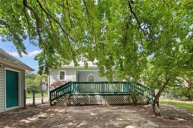 3464 Mcchoen Dr, Fayetteville, NC 28311 - rear view of house featuring a deck