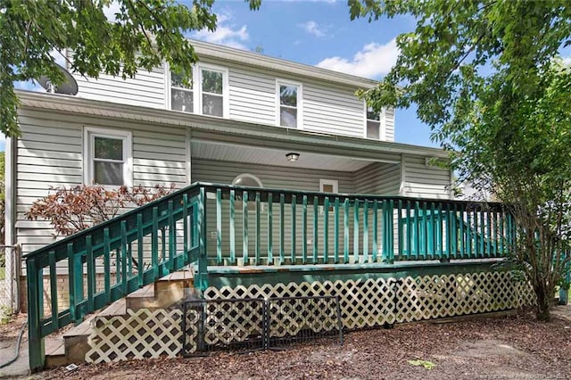 3464 Mcchoen Dr, Fayetteville, NC 28311 - back of house with a wooden deck