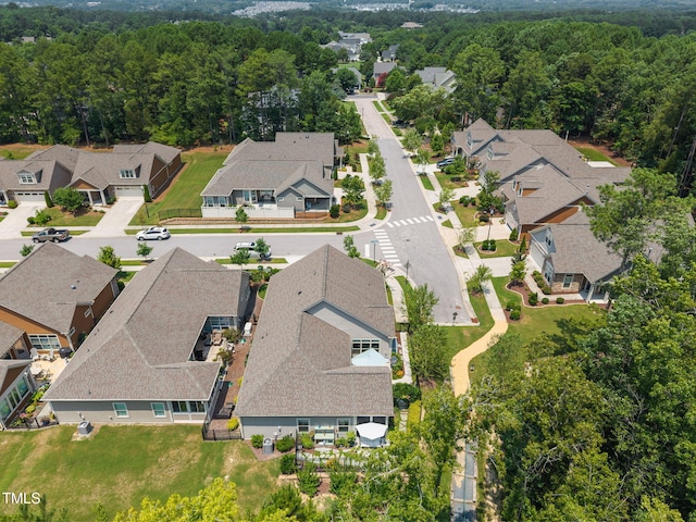 1372 Prevenient Dr, Wake Forest, NC 27587 - aerial perspective of suburban area featuring a forest