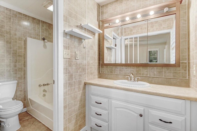 308 Spring Creek Rd, Goldsboro, NC 27534 - bathroom with tile walls, vanity, tile patterned flooring, and shower / tub combination