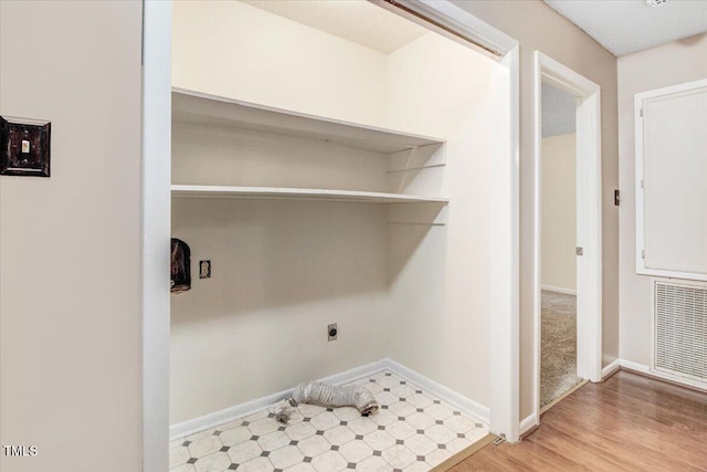 308 Spring Creek Rd, Goldsboro, NC 27534 - laundry area featuring baseboards and electric dryer hookup