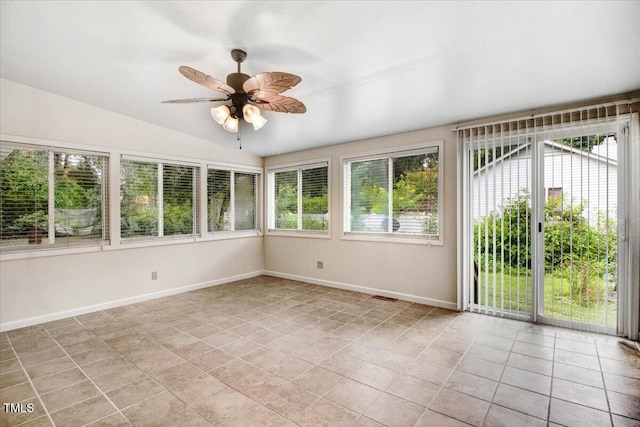 308 Spring Creek Rd, Goldsboro, NC 27534 - unfurnished sunroom featuring vaulted ceiling and tile patterned flooring