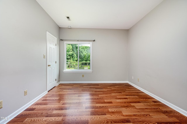 6 Blake Ct, Durham, NC 27712 - spare room with wood finished floors
