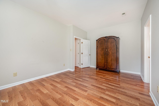 6 Blake Ct, Durham, NC 27712 - unfurnished bedroom with light wood-type flooring