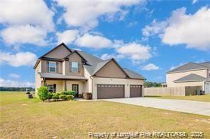 341 Woodington Rd, Hope Mills, NC 28348 - view of front of house with concrete driveway and an attached garage