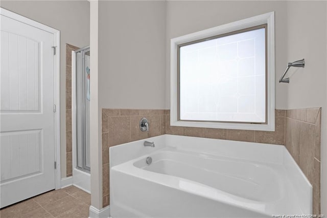 341 Woodington Rd, Hope Mills, NC 28348 - full bath with a garden tub, tile patterned floors, and a shower
