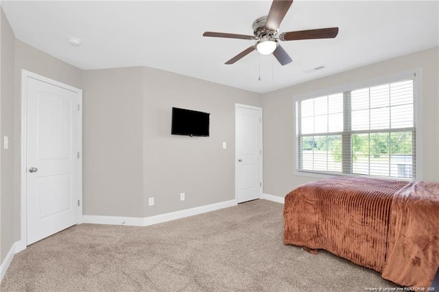 341 Woodington Rd, Hope Mills, NC 28348 - bedroom with light colored carpet and a ceiling fan