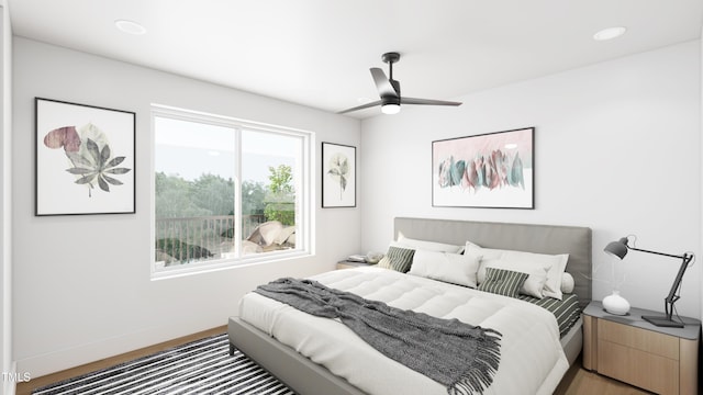 130 Two Hills Dr Unit 403B, Carrboro, NC 27510 - bedroom with wood finished floors, ceiling fan, and recessed lighting