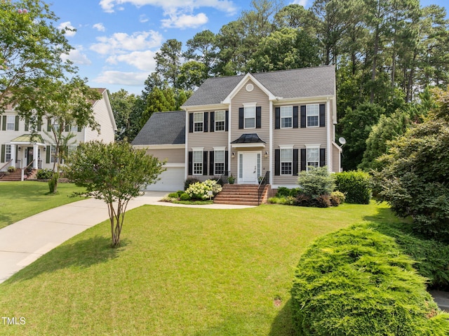 1802 Abby Knoll Dr, Apex, NC 27502 - colonial inspired home featuring driveway, a front yard, a shingled roof, and a garage