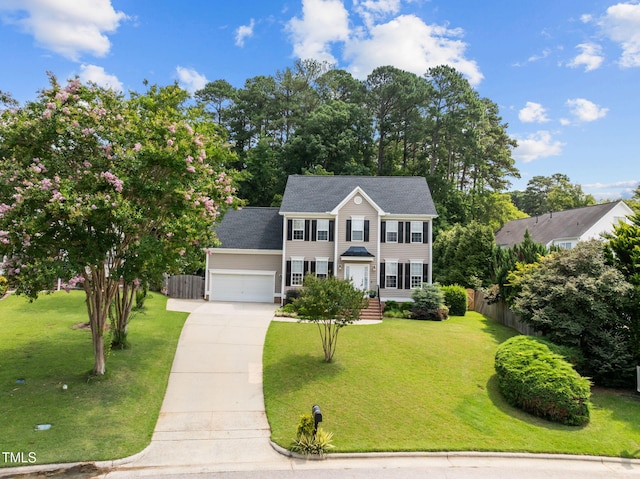 1802 Abby Knoll Dr, Apex, NC 27502 - colonial house featuring concrete driveway and a garage