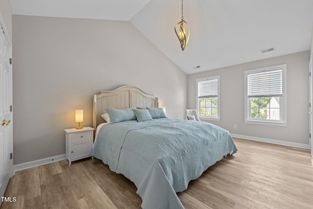 1802 Abby Knoll Dr, Apex, NC 27502 - bedroom featuring light wood-type flooring and lofted ceiling