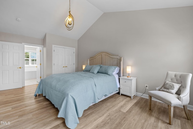 1802 Abby Knoll Dr, Apex, NC 27502 - bedroom featuring light wood-style floors, lofted ceiling, and a closet