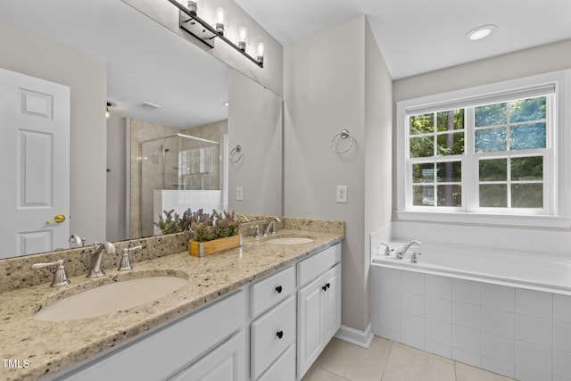 1802 Abby Knoll Dr, Apex, NC 27502 - full bathroom featuring double vanity, a shower stall, tile patterned floors, and a garden tub