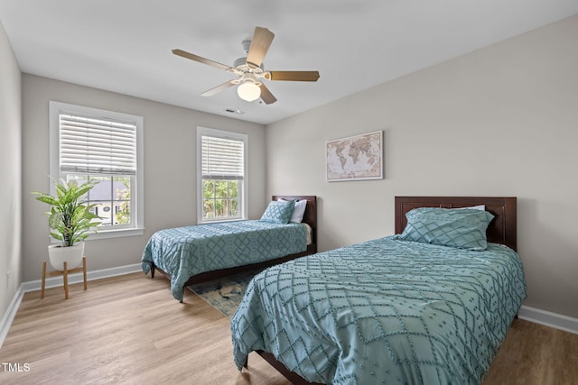 1802 Abby Knoll Dr, Apex, NC 27502 - bedroom featuring light wood-style floors and ceiling fan