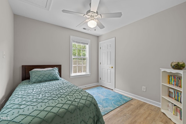 1802 Abby Knoll Dr, Apex, NC 27502 - bedroom featuring wood finished floors and a ceiling fan
