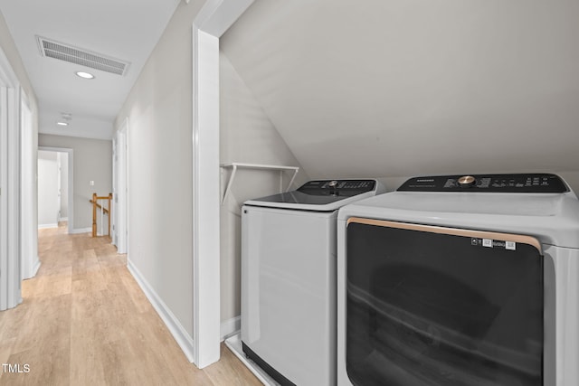 1802 Abby Knoll Dr, Apex, NC 27502 - laundry room featuring washing machine and clothes dryer, light wood-type flooring, and recessed lighting