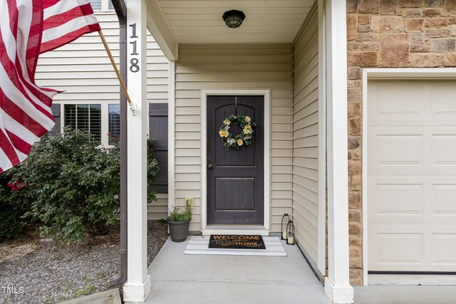 118 Truss Way, Durham, NC 27704 - view of exterior entry featuring stone siding