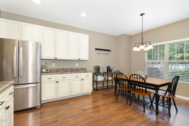 118 Truss Way, Durham, NC 27704 - kitchen with freestanding refrigerator, dark wood finished floors, a chandelier, recessed lighting, and decorative light fixtures
