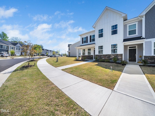 1650 Singing Bird Trl, Wake Forest, NC 27587 - multi unit property with a residential view, board and batten siding, a front lawn, and stone siding